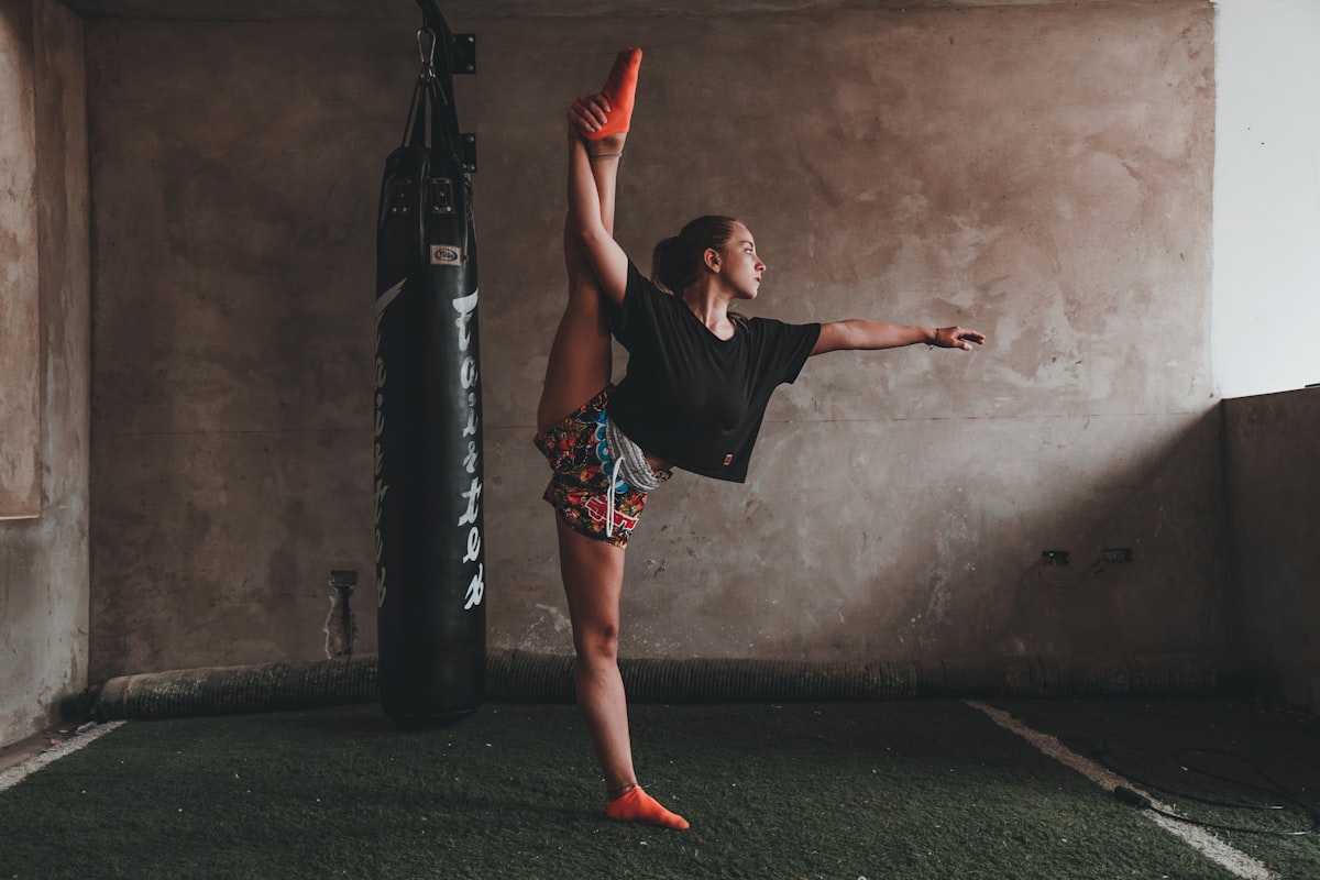 Therapist assessing patient posture and movement mechanics